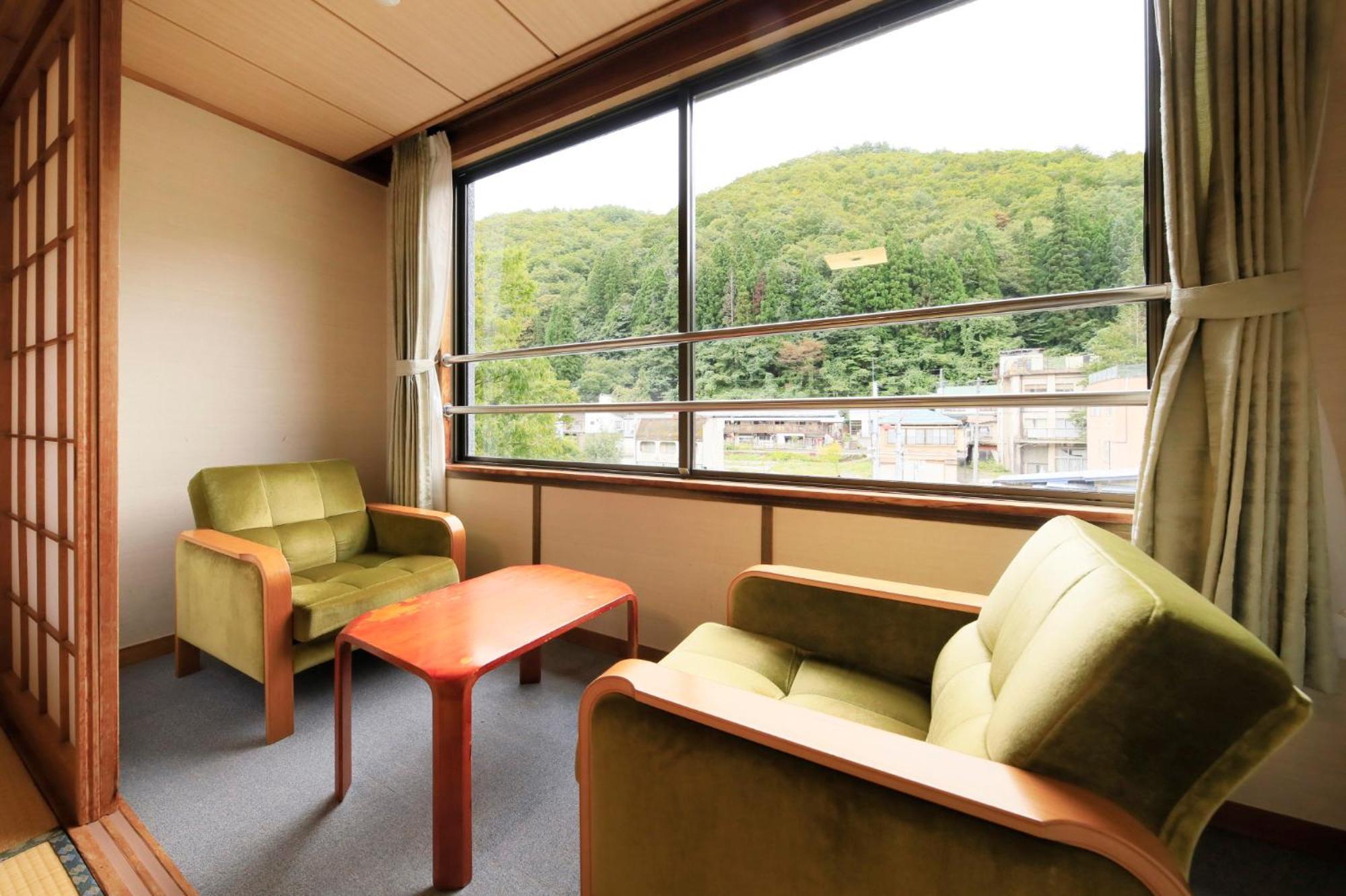 竹あかりの宿 加賀助 Shizukuishi Buitenkant foto